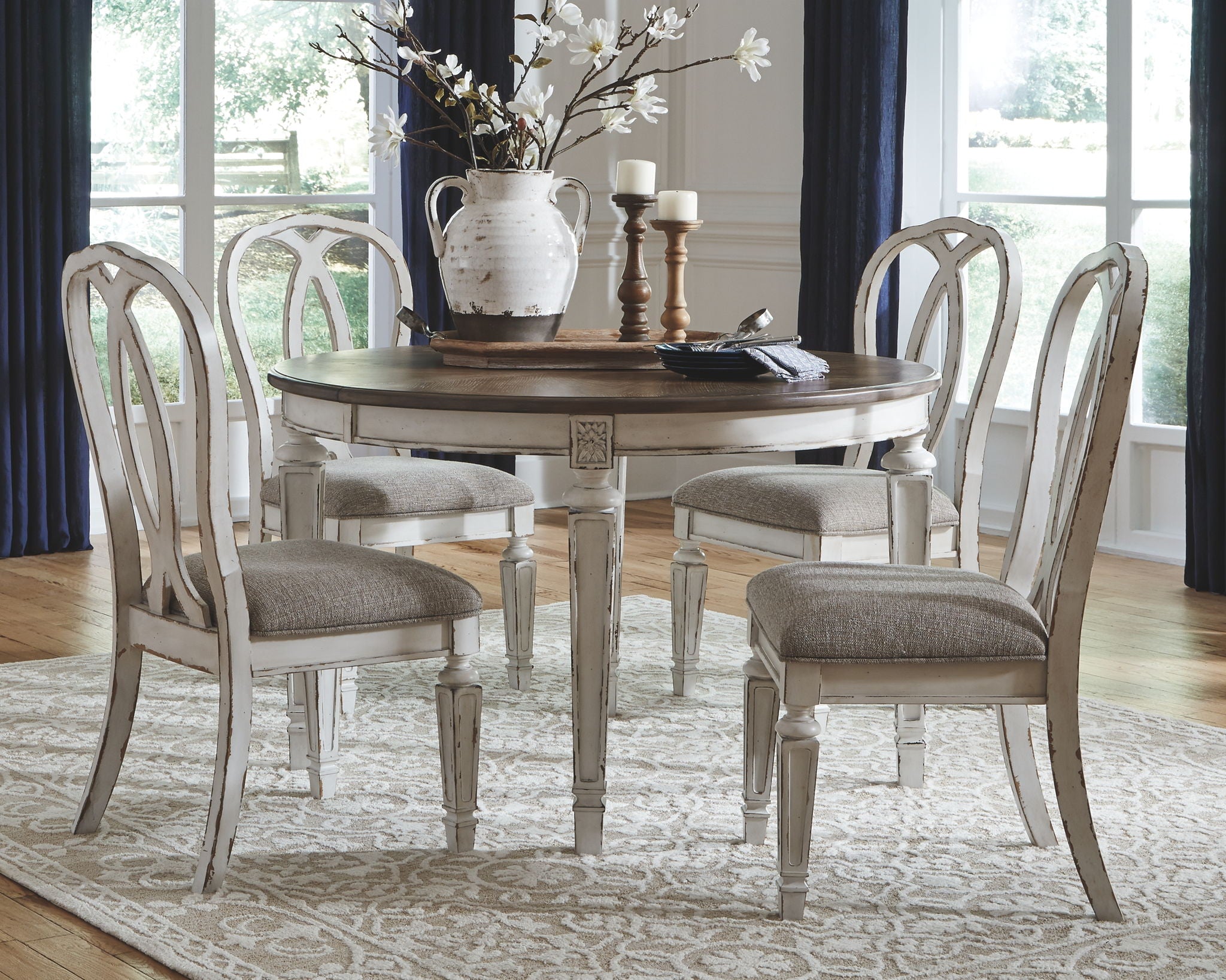 Realyn Oval Dining Room Table and 4 Ribbon Back Chairs