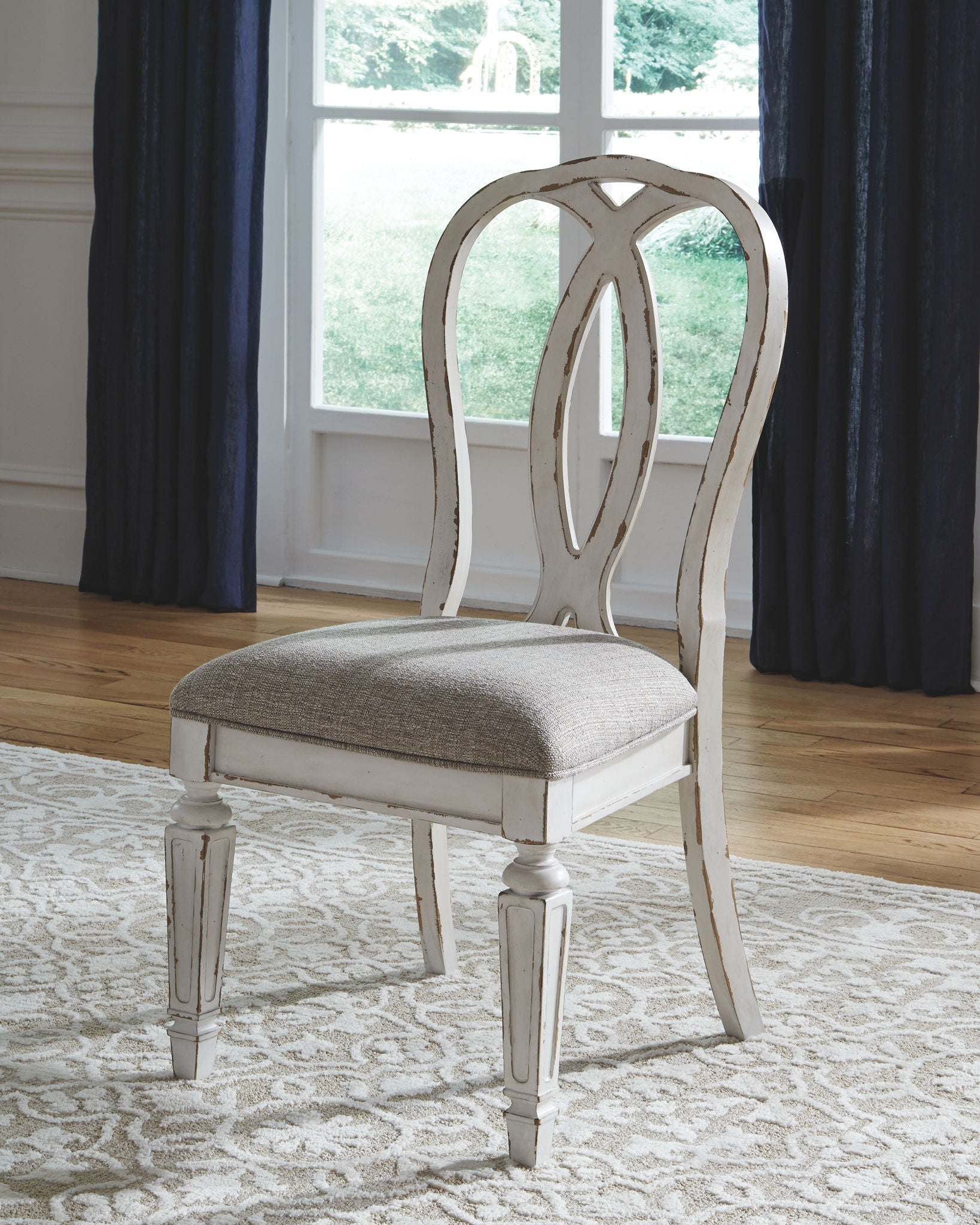 Realyn Ribbon Back Dining Chair